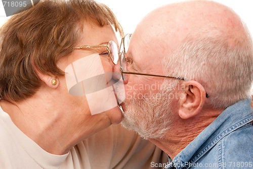 Image of Affectionate Senior Couple Kissing