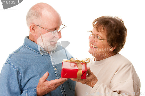 Image of Happy Senior Couple with Gift