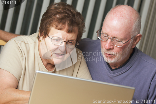 Image of Senior Adults on Laptop Computer