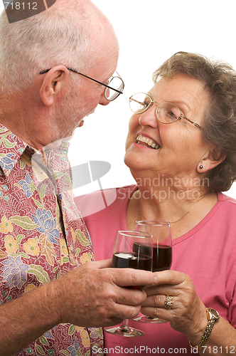 Image of Happy Senior Couple Toasting