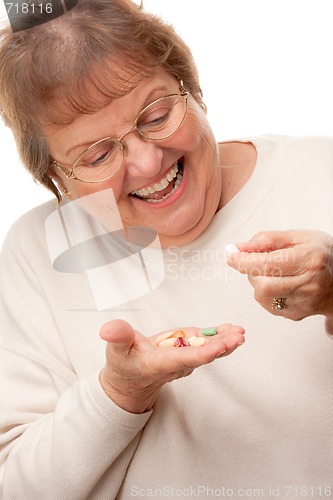 Image of Attractive Senior Woman and Pills

