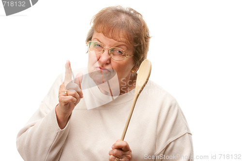 Image of Upset Senior Woman with The Wooden Spoon