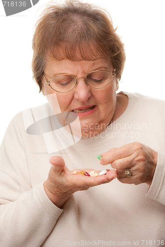 Image of Attractive Senior Woman and Pills
