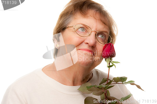 Image of Attractive Senior Woman with Red Rose
