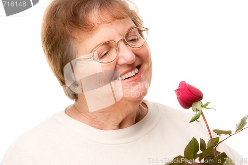 Image of Attractive Senior Woman with Red Rose
