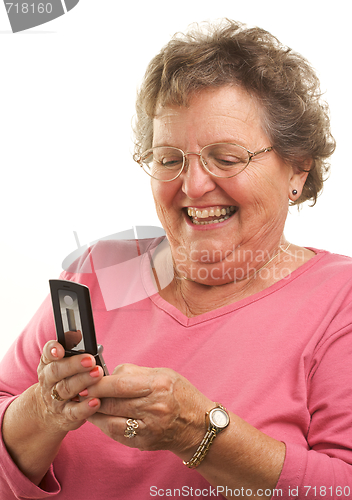Image of Senior Woman Using Cell Phone