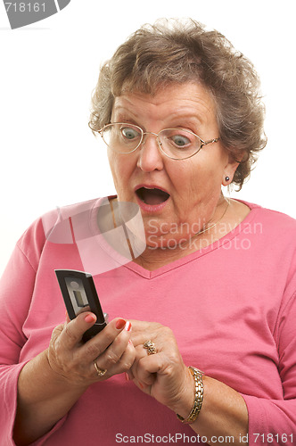 Image of Senior Woman Using Cell Phone