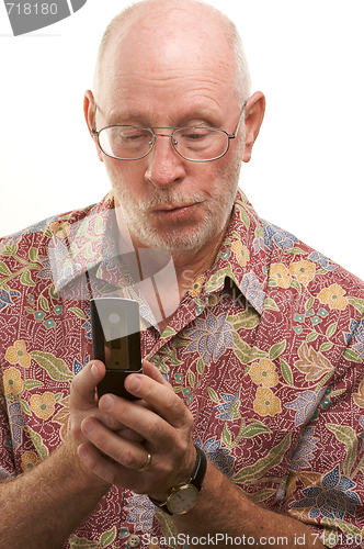 Image of Senior Man Using Cell Phone