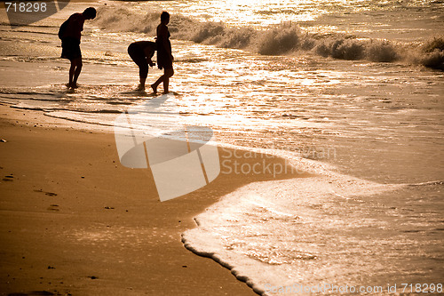 Image of Beach with Silhouette people