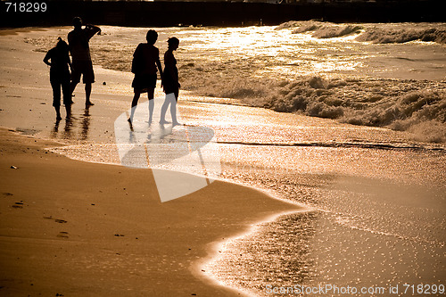 Image of Beach with Silhouette people