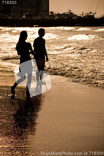 Image of Beach with Silhouette people