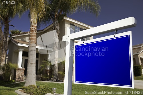 Image of Blank Real Estate Sign and House