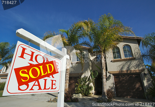 Image of Sold Home For Sale Sign & New House