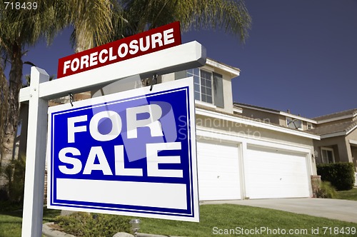 Image of Foreclosure For Sale Real Estate Sign and House