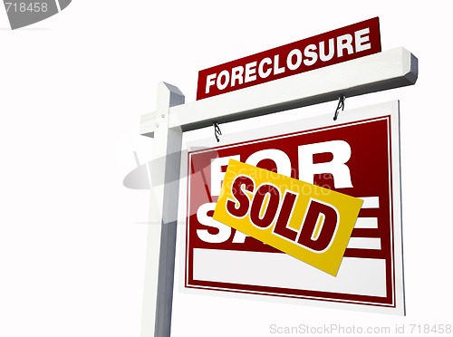 Image of Red Sold Foreclosure Real Estate Sign on White