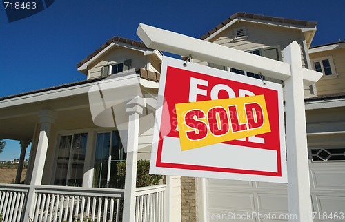 Image of Sold Home For Sale Sign & New Home