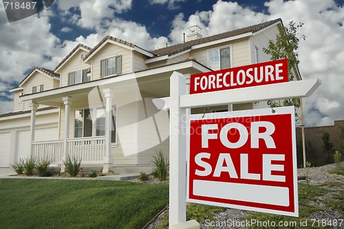 Image of Foreclosure Home For Sale Real Estate Sign and House