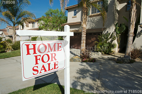 Image of Home For Sale Sign & New Home