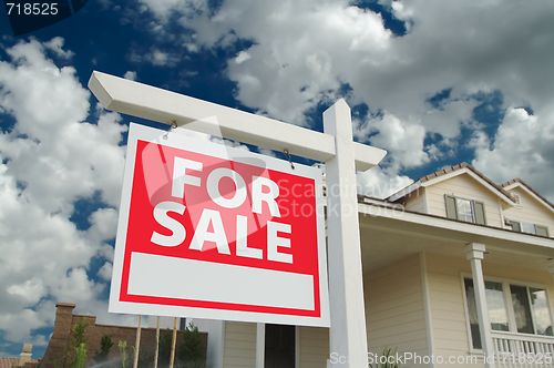 Image of Home For Sale Sign & New Home