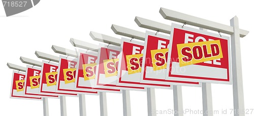 Image of Row of Sold Home For Sale Real Estate Signs Isolated