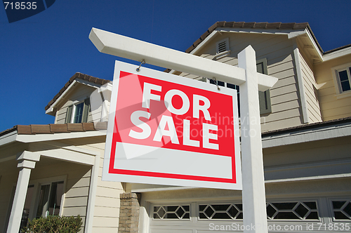 Image of Home For Sale Sign & New Home