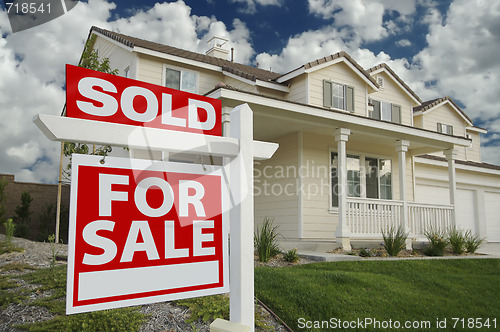 Image of Sold Home For Sale Sign & New Home