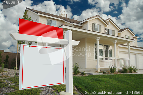 Image of Blank Real Estate Sign & New Home