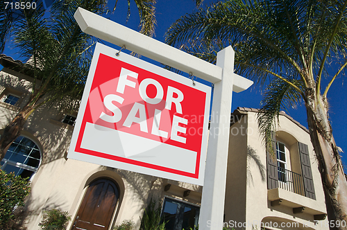 Image of Home For Sale Sign & New Home