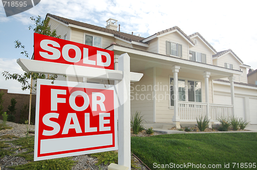 Image of Sold Home For Sale Sign and New Home