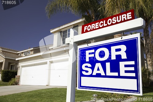 Image of Foreclosure For Sale Real Estate Sign and House