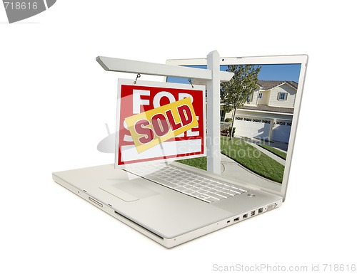 Image of Red Sold For Sale Sign on Laptop