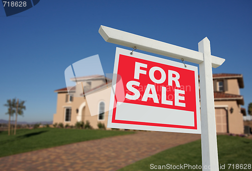 Image of Home For Sale Sign & New Home