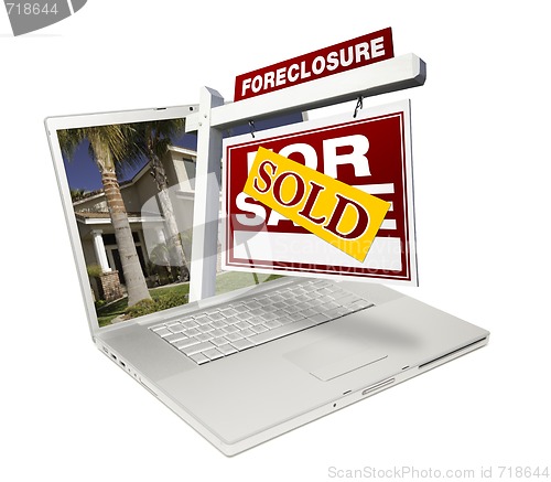 Image of Sold Foreclosure Home for Sale Real Estate Sign Laptop