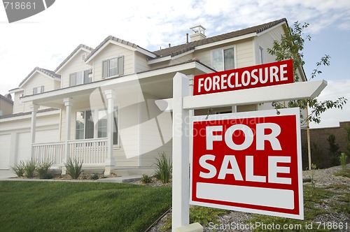 Image of Foreclosure Home For Sale Sign and House