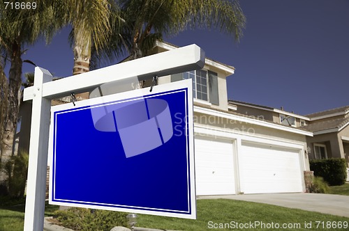 Image of Blank Real Estate Sign and House