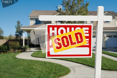 Image of Sold Home for Sale Real Estate Sign and House