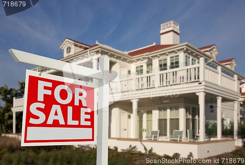 Image of Home For Sale Sign & New Home