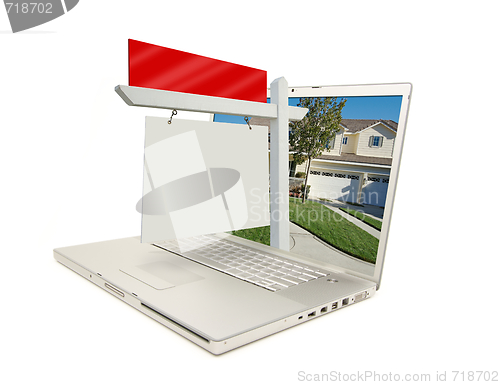 Image of Blank Real Estate Sign & Laptop
