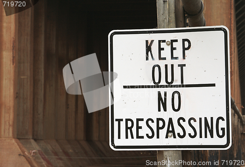 Image of Keep Out Sign and Abandoned Building