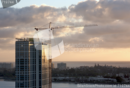 Image of Silhouette of Crane and Building 