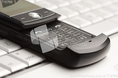 Image of Cell Phone on Laptop Macro