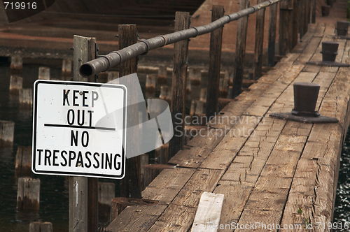 Image of Sign and Abandoned Dock