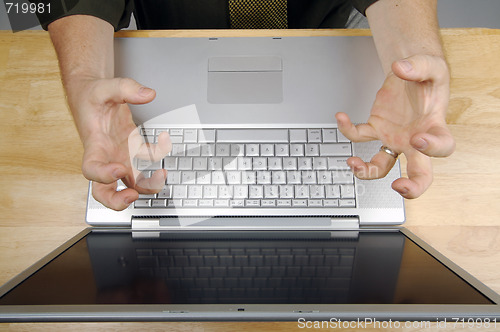 Image of Man Using Laptop