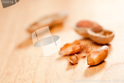 Image of Peanuts on Wood Background