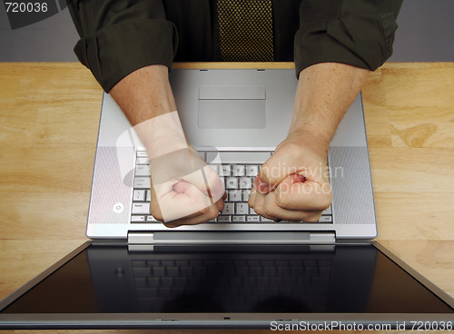 Image of Man Using Laptop