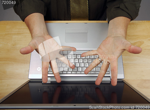 Image of Man Using Laptop