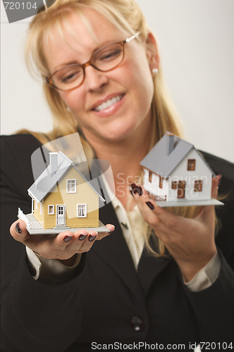 Image of Houses in Female Hands