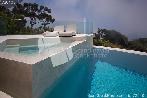 Image of Custom Luxury Pool, Hot Tub and Chairs Abstract