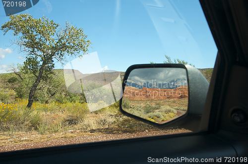 Image of Red Rock Of Utah in Car Mirror