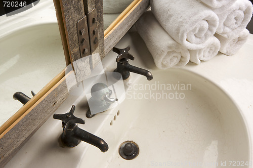 Image of Rustic Bathroom Scene